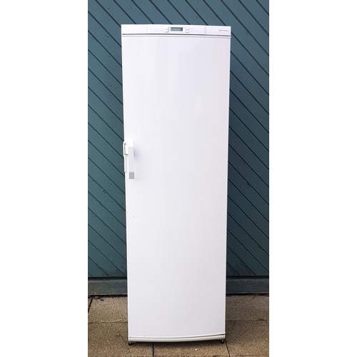 4 - A John Lewis slimline freezer, having seven sectional compartments, H184, W59, D58cm.