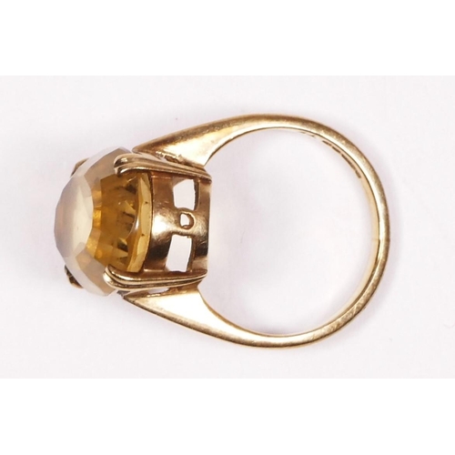 219 - A 9ct gold citrine mounted ring 18 x 14mm, O, 6.3gm.