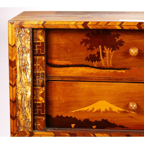 76 - A Japanese Yosegi Zaiku marquetry jewellery cabinet, late 19th century, having five fitted drawers, ... 