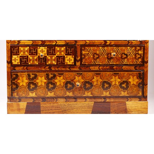 76 - A Japanese Yosegi Zaiku marquetry jewellery cabinet, late 19th century, having five fitted drawers, ... 