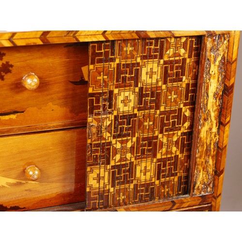 76 - A Japanese Yosegi Zaiku marquetry jewellery cabinet, late 19th century, having five fitted drawers, ... 