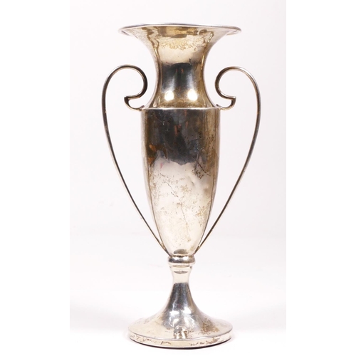 105 - A silver two handled baluster vase, marks worn Birmingham 1918, 16cm, loaded