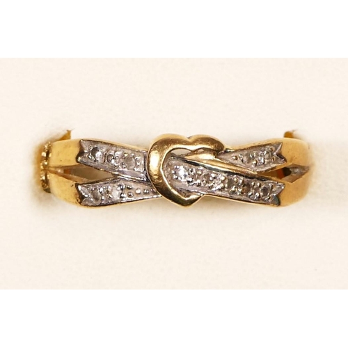 A 9ct gold and diamond crossover ring, shank snapped, P, 2.2gm