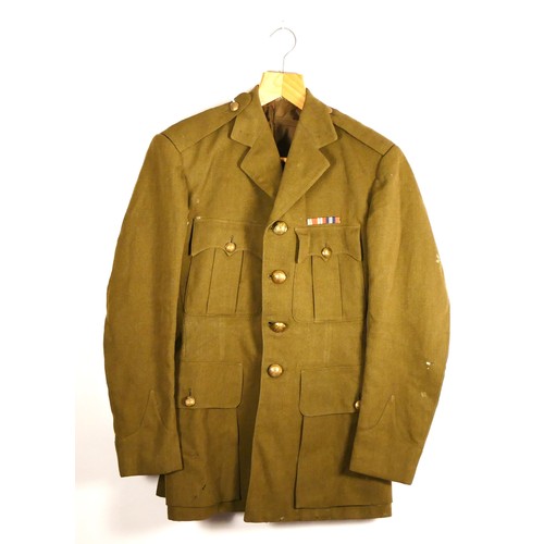 9 - A pair of Second World War Australian Battle dress trousers, signed 452 on internal waistband, toget... 