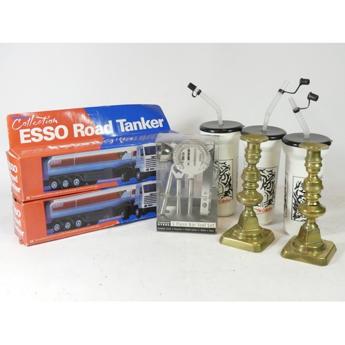 23 - A pair of brass candlestick holders, a silk tie and cufflink set, boxed, Esso themed plastic drink h... 