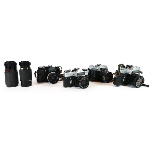 43 - Four Zenit film cameras to include a Zenit-E (x2), EM and a TTL, with lenses, together with two 70mm... 