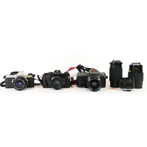 46 - Three Pentax cameras to include a P306, a Super A and an ME Super with lens, together with three len... 