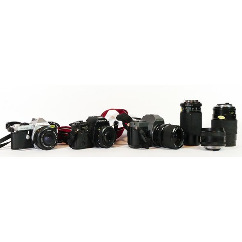 46 - Three Pentax cameras to include a P306, a Super A and an ME Super with lens, together with three len... 