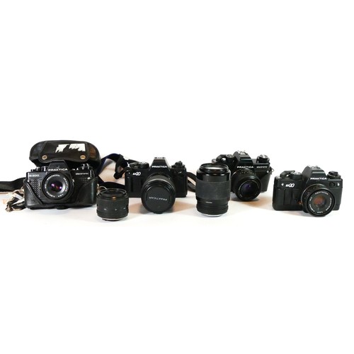 51 - Four Praktica film cameras to include a B200, a B100 and two BX20 with lenses, also including two le... 