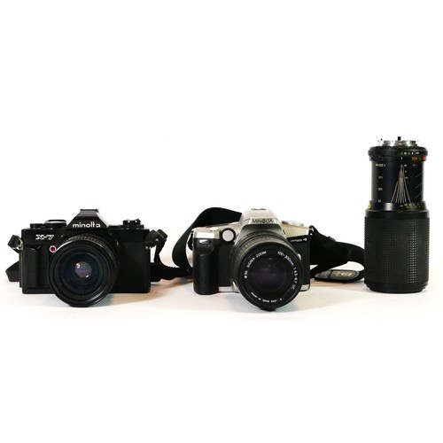 52 - A Minolta X-7 film camera with a 35mm-70mm lens, a Minolta Dynaxx 4 with a 100mm-300mm lens and a 75... 
