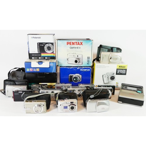 56 - A collection of digital cameras and accessories to include a Polaroid IS426, a Fujifilm S8000FD, an ... 