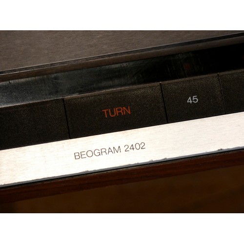 65 - A Bang & Olufsen sound system to include a Beomaster 2400-2 amplifier with built in tuner, a Beocord... 