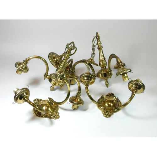 75 - A pair of cold cast chandelier, brassed, each consists of three arched arms holding a shade, togethe... 