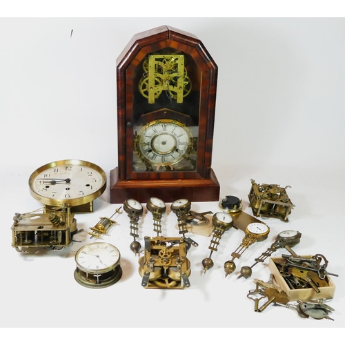 A quantity of clock/watch parts together with a collection of clock