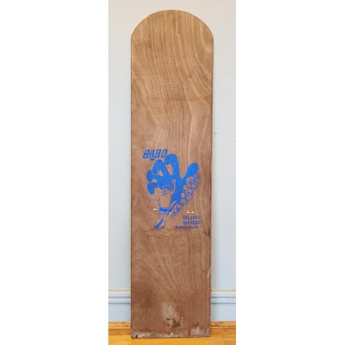 97 - A 1970s surfing bodyboard by Bilbo, retailed by Surf Shop of Newquay, 122cm long.