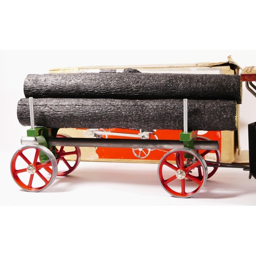 90 - A Mamod live steam tractor, together with a Mamod lumber wagon (boxed) (2)
