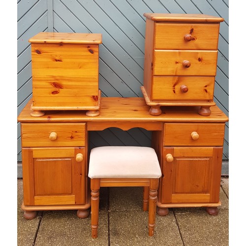 A modern pine dressing table with matching stool, together with a three