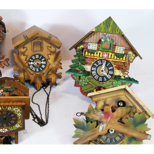Seven small cuckoo clocks, for spares or repair.