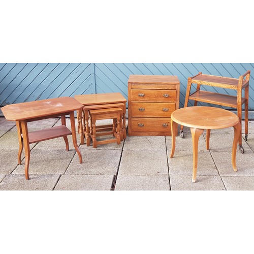 613 - A selection of mid 20th century furniture pieces, to include a three height chest of drawers, H64, W... 