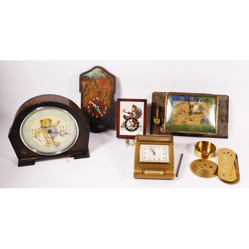 A Smith's novelty mantel clock, dial depicting a bear with drum flanked by two sets of three soldiers, with articulated nodding head, 17cm tall, together with a Reviel Amine Mounier musical clock (no case), c,1952, with a Hummel miniature cuckoo style clock and a similar painted example, also with a Monarch clock and calendar, brass case (damaged) (5)
