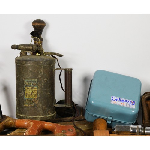 5 - A collection of carpenters hand tools, to include moulding planes, box planes, hand saws, Stanley pl... 