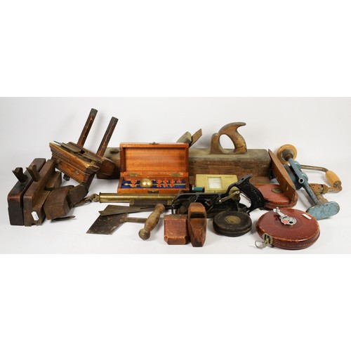 5 - A collection of carpenters hand tools, to include moulding planes, box planes, hand saws, Stanley pl... 