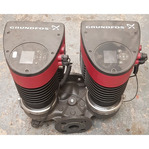 18 - A Grundfos Magna 3 (model number- D40-100 F 220) circulating heating pump.