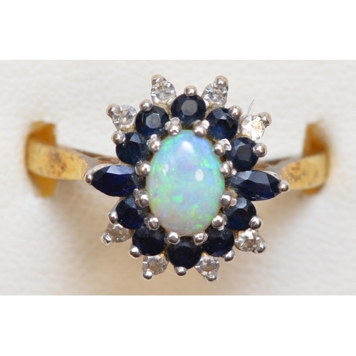 462 - An 18ct gold, opal sapphire and diamond cluster ring, O, 4.9gm