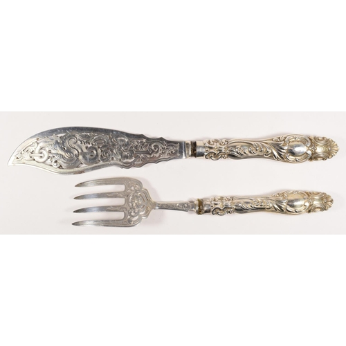 11 - A Victorian silver pair of silver knife and fork, by Martin Hall & Co., Sheffield, 1853, the handles... 