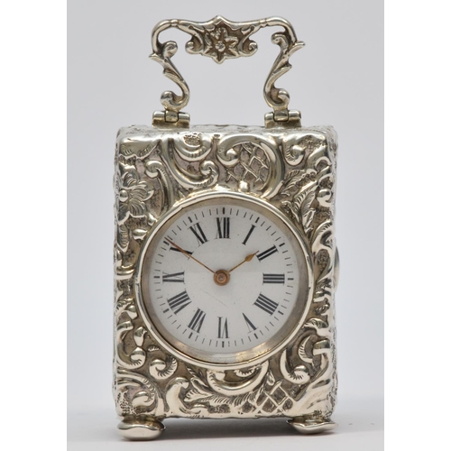 16 - A Victorian silver boudoir clock, Birmingham 1898, white enamel dial with Roman numerals, French mov... 