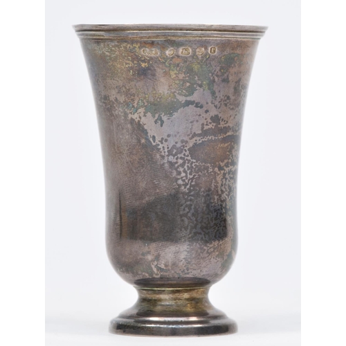 21 - A Victorian silver communion cup, Birmingham 1860, engraved IHS, gilt interior, 7cm, 33gn