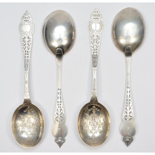28 - A Victorian silver set of four fancy spoons, London 1853, with pierced and engraved decoration, 23cm... 