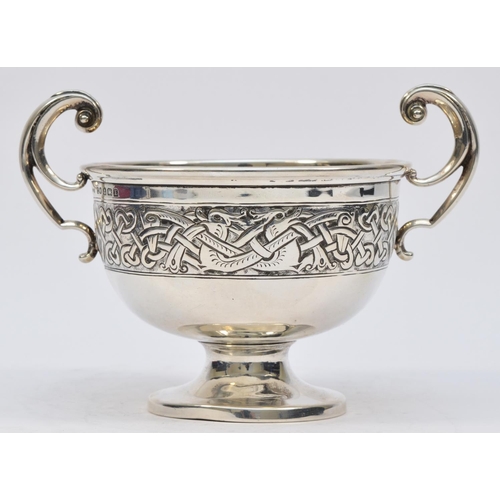 31 - A silver Celtic two handled bowl, by Charles Weale, Birmingham 1929, with Dublin import marks for 19... 