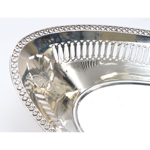 32 - A silver oval pierced bowl, by James Dixon & Son, Sheffield 1929, with hoop border, 27 x 14.5cm, 232... 
