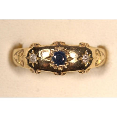 49 - An Edwardian 18ct gold sapphire and diamond star gypsy set three stone ring, Birmingham 1905, T, 2.8... 