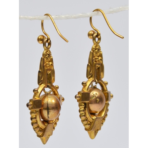 65 - A Victorian pair of 9ct gold hollow drop earrings, stamped 9c, articulated balls, 30mm, 2.6gm