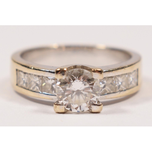 70 - A white gold and brilliant cut diamond single stone ring, tests as 18ct, approximately 0.70cts, colo... 