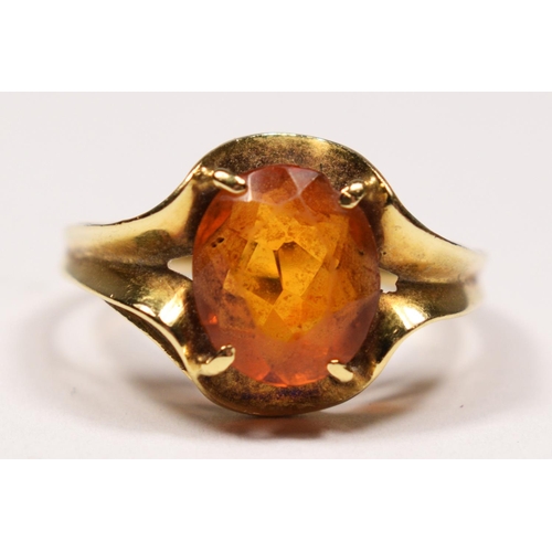 76 - A 585 gold (14ct) and citrine dress ring, wavy claw set with an oval mixed cut stone, 10 x 8mm, 3.5g... 