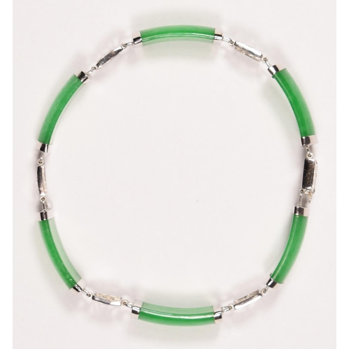 79 - A Chinese 14K white gold and jade panel link bracelet, untested for colour enhancement, 18cm, 11gm.