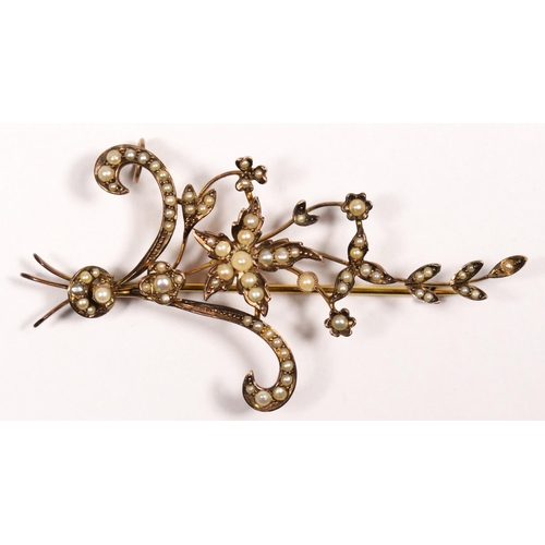 98 - A Victorian 9ct and half pearl floral spray brooch, stamped 9ct, set with half pearls, 68 x 38mm, 6.... 