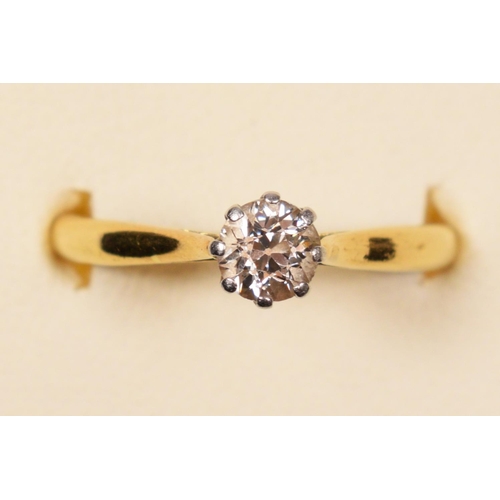 103 - An 18ct gold single stone diamond ring, claw set with an old cut brilliant stone, weighing approxima... 