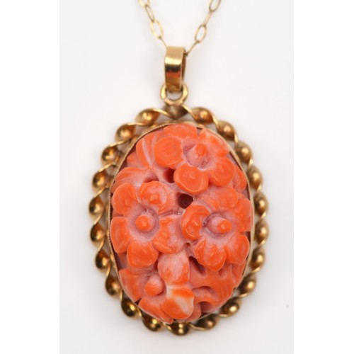 108 - A vintage 9ct gold mounted carved coral pendant, Birmingham 1978, 23 x 17mm, chain, 5.5gm