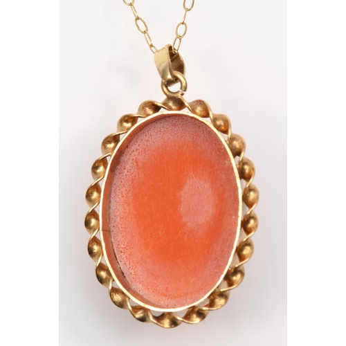 108 - A vintage 9ct gold mounted carved coral pendant, Birmingham 1978, 23 x 17mm, chain, 5.5gm