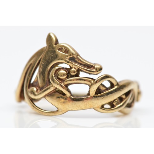 117 - Ola Gorie, Orkney, a vintage 9ct gold Celtic dragon ring, Edinburgh 1994, N, 4.8gm
Ola, born 1937 Ki... 