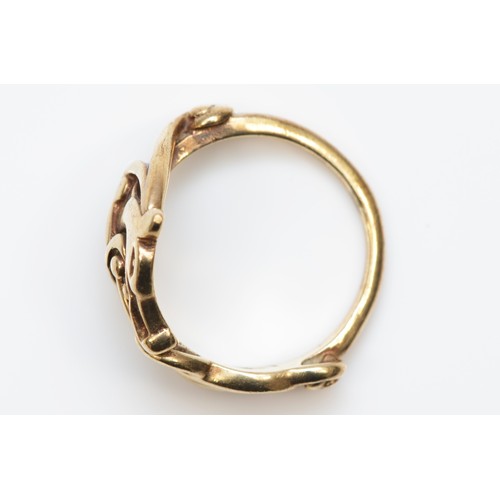 117 - Ola Gorie, Orkney, a vintage 9ct gold Celtic dragon ring, Edinburgh 1994, N, 4.8gm
Ola, born 1937 Ki... 