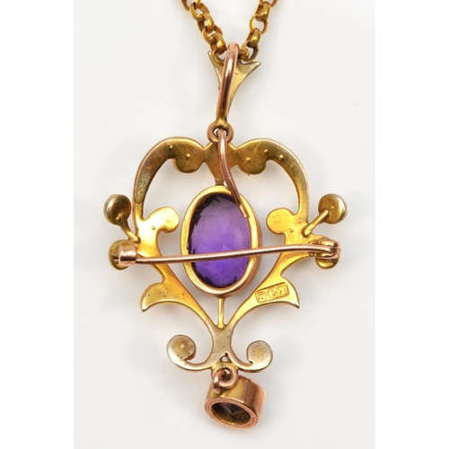 124 - A Victorian 9ct gold, amethyst and half pearl openwork scroll brooch pendant, 42mm overall, to a 9ct... 