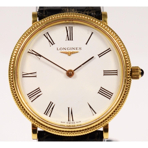 139 - A Longines, 18k gold manual wind gentleman's wristwatch, c.1980, the white dial with black Roman num... 