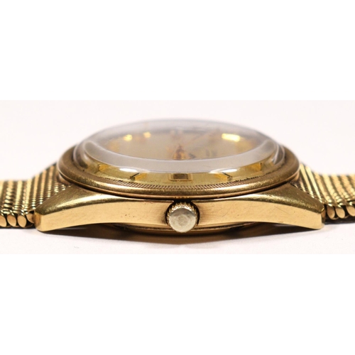 145 - Omega, a 9ct gold automatic day/date gentleman's wristwatch, ref 1061, London 1972, the gilt dial wi... 