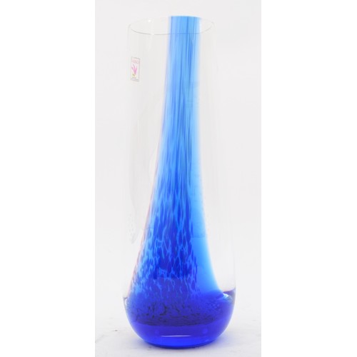 157 - A Caithness blue glass tapering vase with wheel engraved otter design, 23cm together with a Caithnes... 