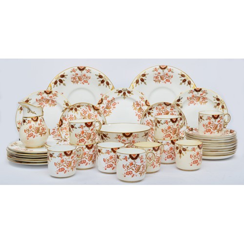 177 - A Victorian tea service, gilt and red floral pattern, numbered 7988, comprising 10 tea cups, 12 sauc... 